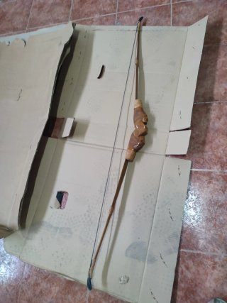 Arco de madera tallada