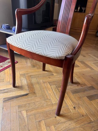 Mesa de comedor redonda de madera y cristal