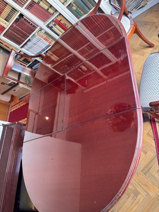Mesa de comedor redonda de madera y cristal