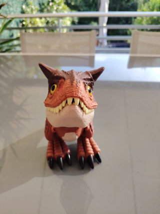 Dinosaurio de juguete con sonido