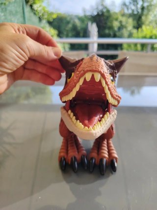 Dinosaurio de juguete con sonido