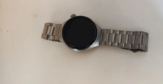 Reloj digital plateado buen estado no se la marca