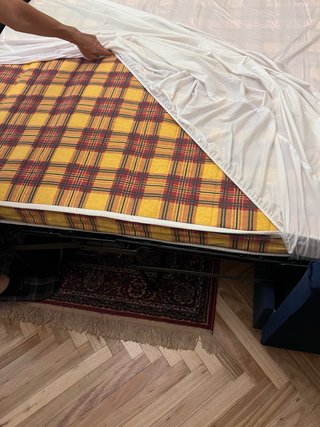 Sofá cama tela azul y amarillo