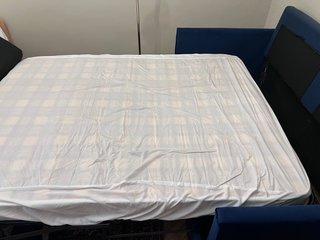 Sofá cama tela azul y amarillo