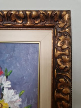 Pintura al óleo de flores con marco