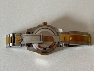 Reloj R****