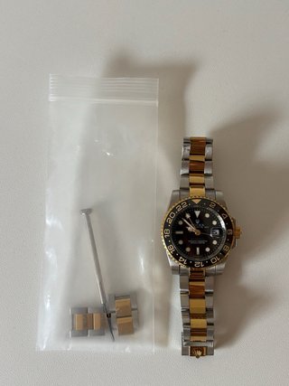 Reloj R****