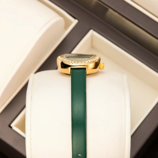 Reloj Jialuisi Mujer Ovalado Dorado y Verde