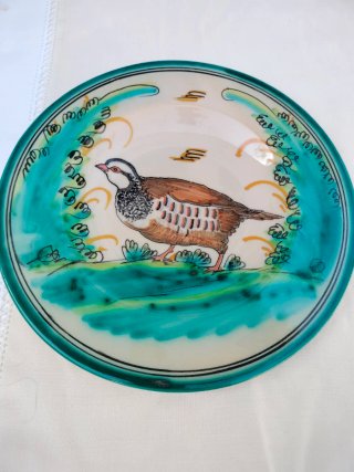 Plato decorativo de cerámica con perdiz