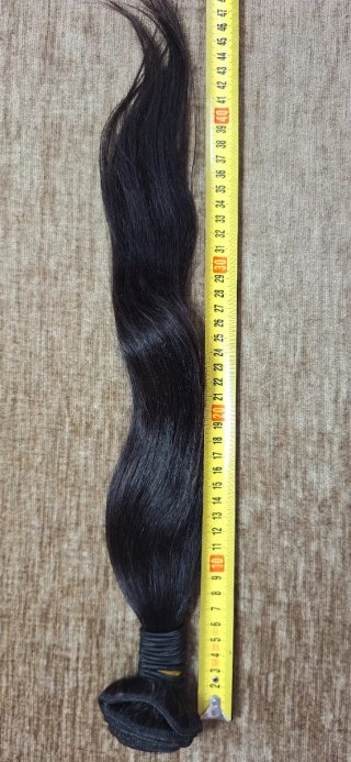 Pelo natural castaño oscuro