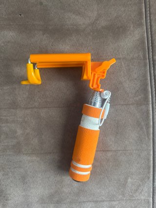 Mini trípode naranja para móvil