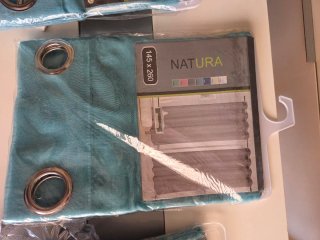 CUATRO Cortinas NATURA turquesas con ollados.