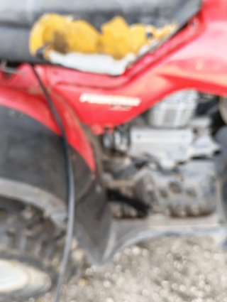 Honda Cuatrimoto Roja Todoterreno