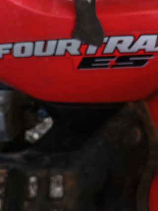 Honda Cuatrimoto Roja Todoterreno