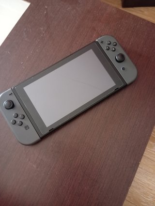 Nintendo Switch + Funda + microSD 128GB