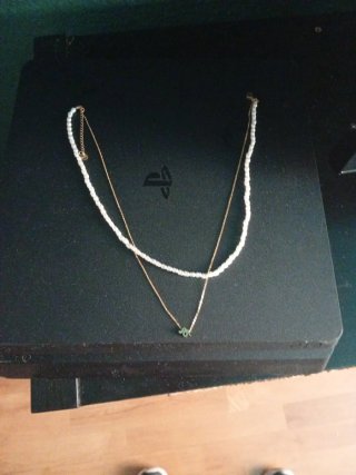 Collar plata con dijes (estrella, sol, serpiente)