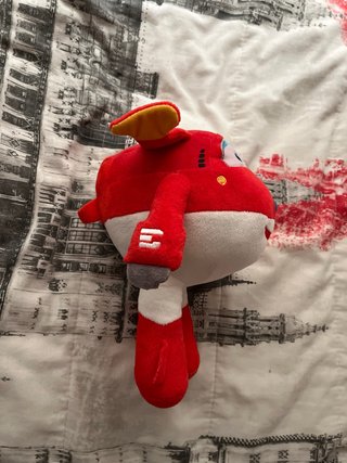 Peluche avión Super Wings rojo