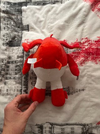 Peluche avión Super Wings rojo