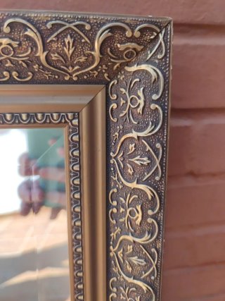 Espejo decorativo labrado