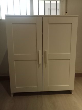 Mueble blanco estantería y tv