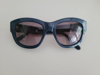 Gafas de sol Máximo Dutti azules.