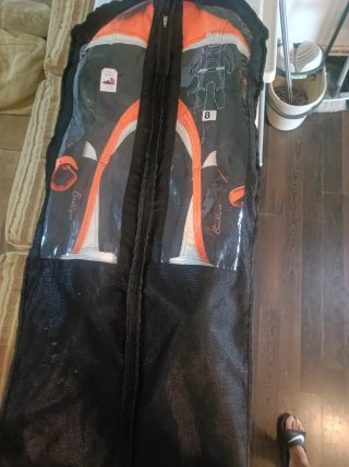 Traje de moto infantil naranja y negro