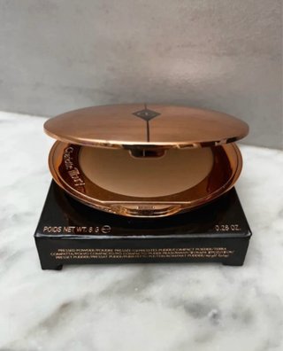 Charlotte Tilbury Polvos Compactos Beige Dorado