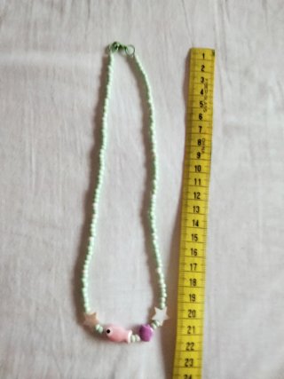 Collar de cuentas pez, estrellas y concha
