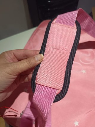 Bolsa portátil rosa con estrellas