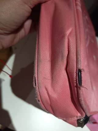 Bolsa portátil rosa con estrellas