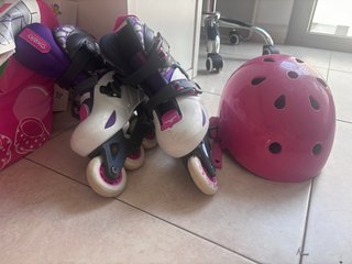 Patines y casco niña rosa