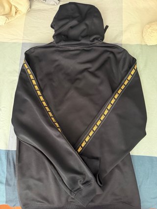 Chándal Nike Negro con Logo Dorado