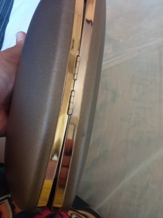 Bolso de fiesta rígido dorado