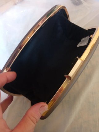 Bolso de fiesta rígido dorado