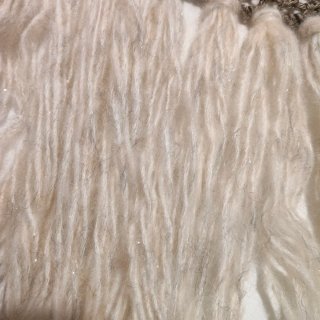Chal plumoso de algodón con flecos