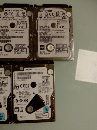 Lote 9 discos duros 2.5 HGST 250GB