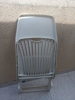 Silla plegable blanca exterior