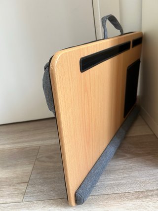Soporte portátil con cojín