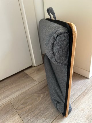 Soporte portátil con cojín