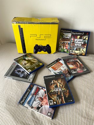 PlayStation 2 Slim +2 mandos + 8 juegos originales