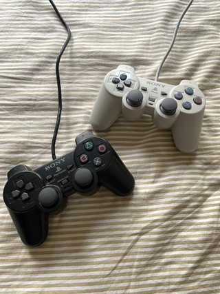 PlayStation 2 Slim +2 mandos + 8 juegos originales