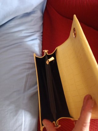 Bolso de mano con asa trenzada