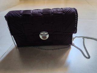 Bolso de mano marron tejido artesanal