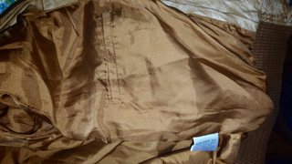 Chaqueta de cuero marrón y amarilla
