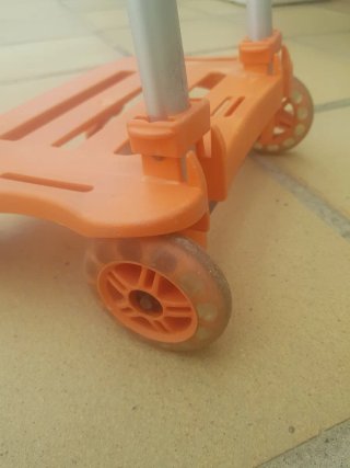 Carro para mochila naranja