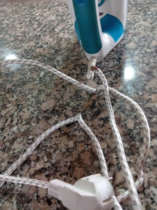 Plancha de vapor azul y blanca