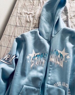 Sudadera con cremallera azul turquesa