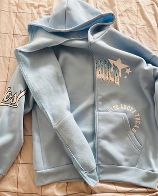 Sudadera con cremallera azul turquesa