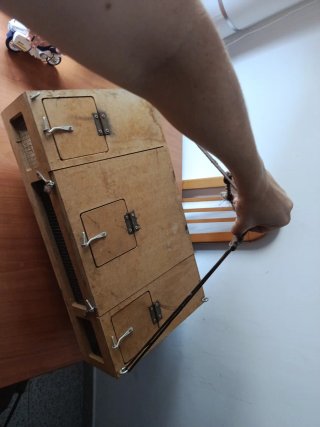 Transportín para pájaros de madera