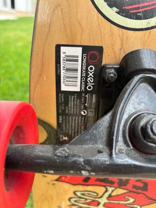 Skate OXELO Negro con Rayas